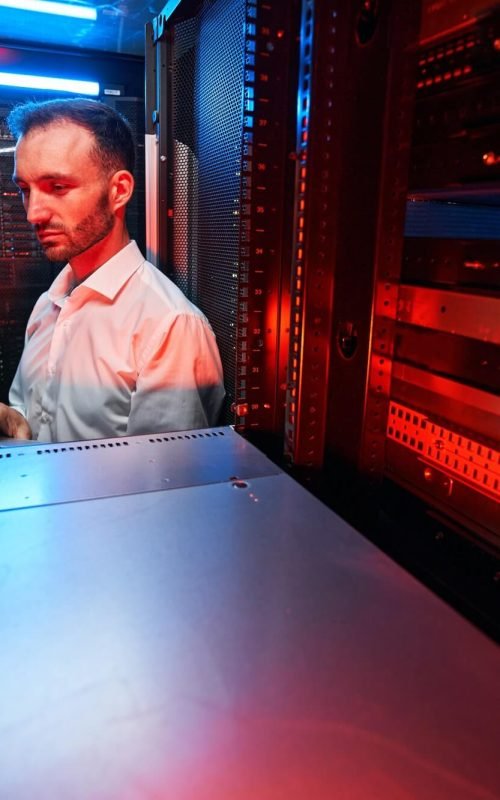 data-center-administrator-inspecting-server-rack-software-1.jpg data-center-administrator-inspecting-server-rack-software-1.jpg